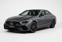 2025 Mercedes-AMG C63 S E Performance front view, grey color, parked outdoors.