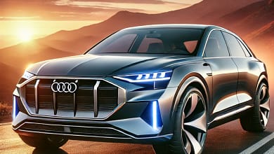 Audi Q8 SUV with sleek design, LED headlights, and sporty wheels on a mountain road at sunset.