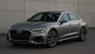 2025 Audi A5 Sedan in metallic silver on scenic road.