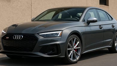 2025 Audi S5 parked on a scenic road with a sporty design.
