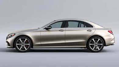 2025 Mercedes-Benz C-Class silver luxury sedan on city street