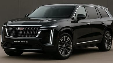 2026 Cadillac Escalade IQ electric SUV parked on modern city street.