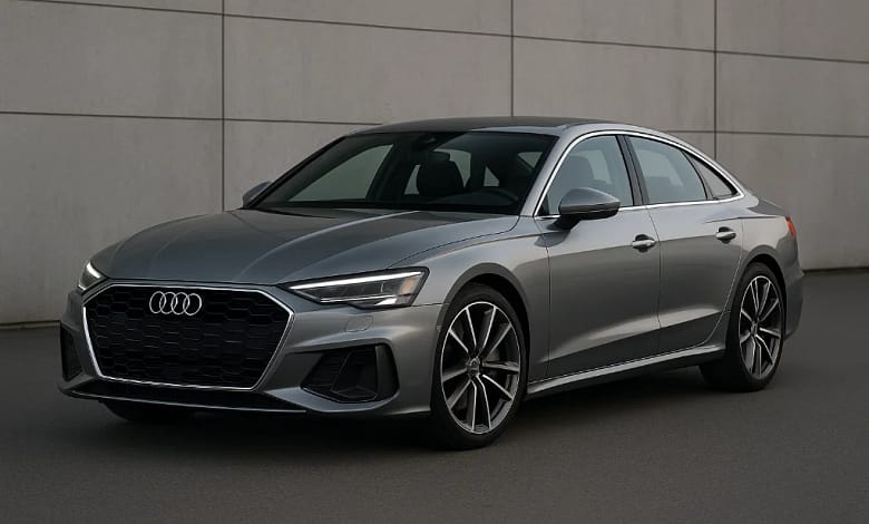 2025 Audi A5 Sedan in metallic silver on scenic road.